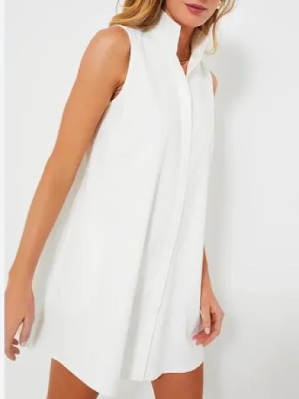 White sleeveless button-front top